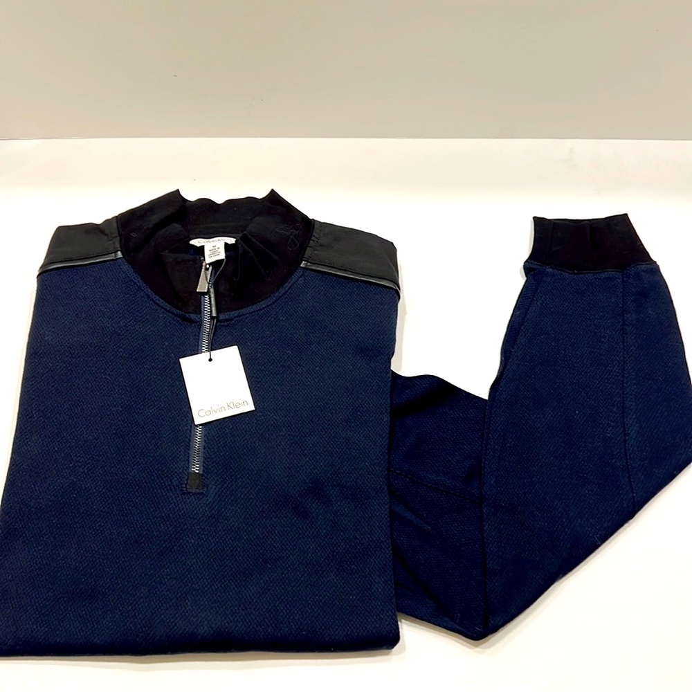 Calvin Klein light weight long sleeve shirts with zipper in the front size M